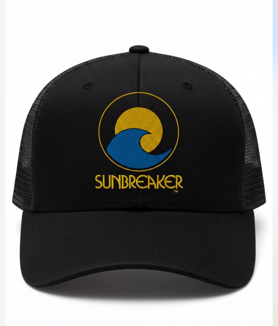Black trucker cap with 'SUNBREAKER' logo featuring a yellow sun and blue wave on a white background.